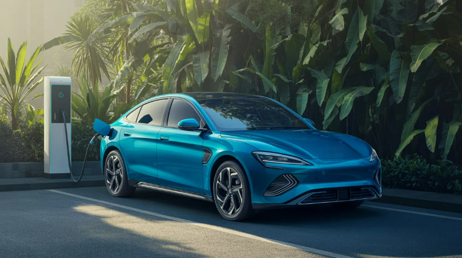 electric vehicle Indonesia 2026 dengan mobil listrik dan charging station modern